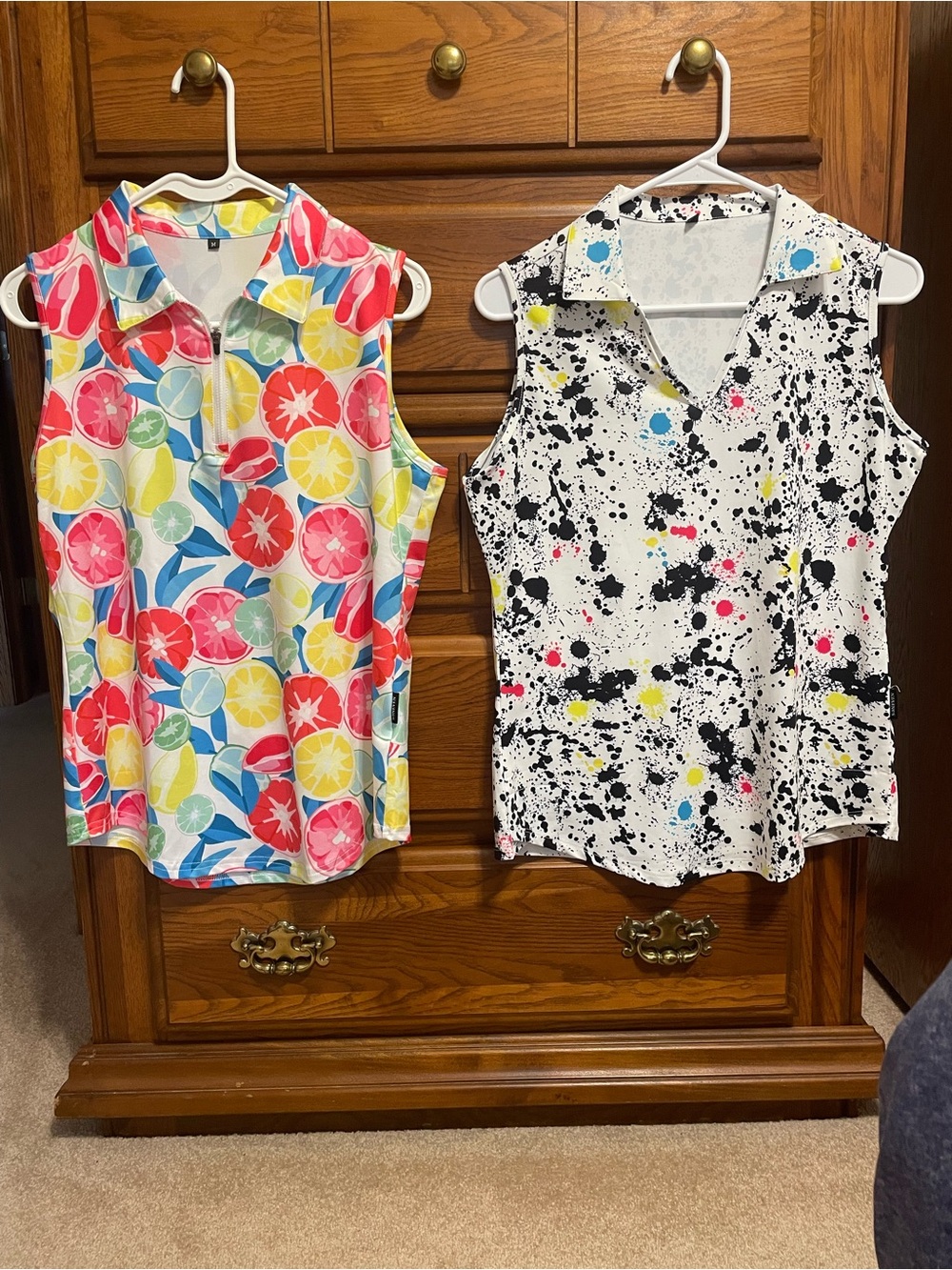 2 Sleeveless Print Polo/ Golf Tops, Multicolor Fruit print and Splatter Print.
